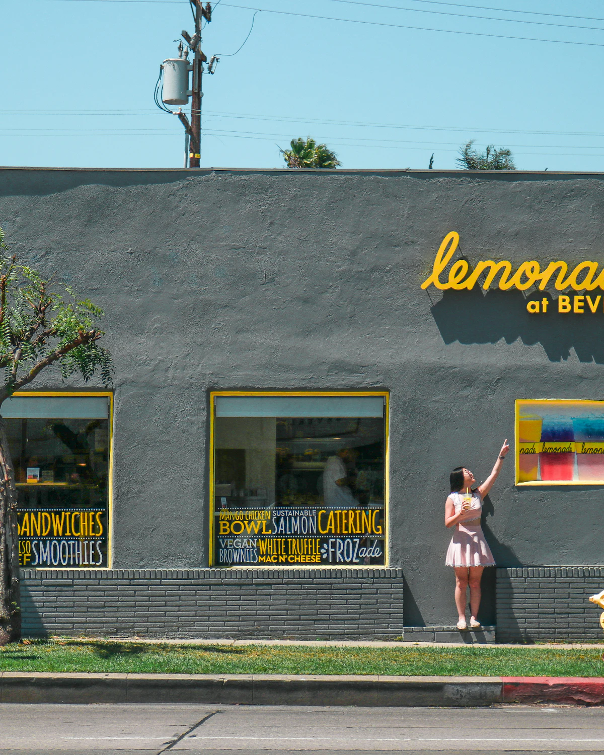 Painted storefront sign on a Los Angeles shop